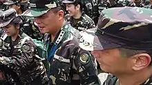 AFP Chief of Staff - Gen Gregorio Pio P Catapang AFP is led by LTC Peter C Suchianco (GSC) JAGS to the designated area for tree planting during the 35th NRW.