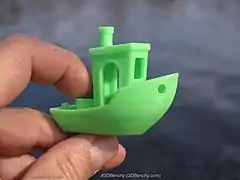 A 3DBenchy printed on a fused deposition modeling (FDM) 3D printer