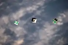 Three cubesats in space