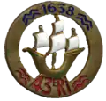 Insignia of the 43rd Infantry Regiment (blue waves and characters on top, red below)