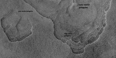 Scalloped terrain labeled with both low center polygons and high center polygons, as seen by HiRISE under HiWish program Location is Casius quadrangle.  Image enlarged with HiView.