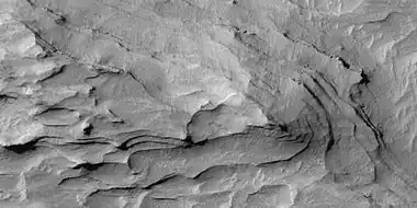 Close view of mound with layers, as seen by HiRISE under HiWish program Note: this is an enlargement from a previous image.