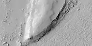 Close view of layers from previous image, as seen by HiRISE under HiWish program  Some dark slope streaks are visible.