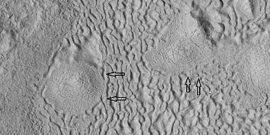 Brain terrain being formed, as seen by HiRISE under HiWish program Note: this is an enlargement of a previous image using HiView. Arrows indicate spots where brain terrain is beginning to form.