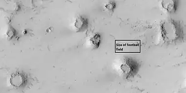 Close view of cones with the size of a football field shown, as seen by HiRISE under HiWish program