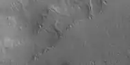 Close view of slopes that contain tilted layered features, as seen by HiRISE under HiWish program  Note: this is an enlargement from the previous image.