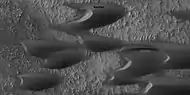 Close view of sand dunes, as seen by HiRISE under HiWish program A birchen dune is labeled.