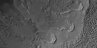 Close view of gully from a previous image, as seen by HiRISE under HiWish program Curved ridges may have formed by glaciers before the gullies were created.