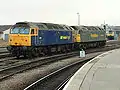 Class 47/0 No. 47237, in Advenza Freight livery and Class 57 No. 57005 in Freightliner livery at Derby railway station in 2008