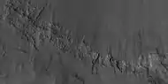 Close view of layers in crater wall,  as seen by HiRISE under HiWish program