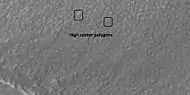 High center polygons, as seen by HiRISE under HiWish program  Boxes surround two individual polygons.