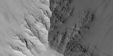 Close view of layers in the Louros Valles, as seen by HiRISE under HiWish program; this is an enlargement of a previous image.