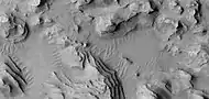 Close view of layers, as seen by HiRISE under HiWish program  A fault is visible.