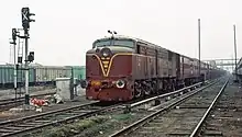 A broad gauge class WDM-1 locomotive with an evening train at Gorakhpur Junction in December 1993