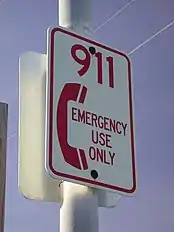 Sign reading "911 emergency use only"