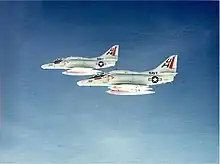 Douglas A-4F Skyhawks of VC-7, 1975 Taken by Lt. Pete Naff. Lt.Charlie "Tuna" Paine(Lead) and LTJG Gary "Easy" Staggs(Wingman)