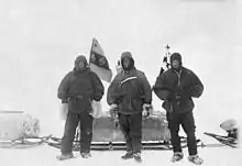 Members of the Discovery Expedition wearing thick fur mittens (1902)