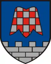 Coat of arms of Großsteinbach in Austria, depicting a stylised flower of Fritillaria meleagris