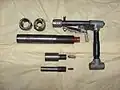 A very crude yet functioning homemade gun made by a man in India; it is constructed mostly out of plumbing material