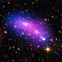 MACS J0416.1-2403 contains a significant amount of dark matter, which leaves a detectable imprint in visible light by distorting the images of background galaxies.