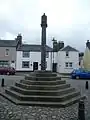 The cross at Abernethy. An example of a war memorial in the form of a mercat cross.