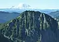 North aspect of Abiel Peak, with Mt. Rainier in the distance.