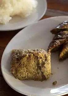 Aep ong-o, a northern Thai dish of chopped pig's brain mixed with egg and a Thai curry paste. It is wrapped in banana leaves and grilled.