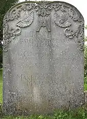 Colour photograph of a sandstone headstone