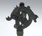 Copy of the Aghadoe Crozier, Swedish History Museum, Stockholm. Originating from Aghadoe, County Kerry in the early 12th century, the crozier is formed from a single block of Walrus ivory, and contains a spiral design on the crook showing the head of an animal biting a human figure.