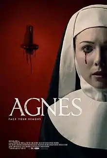 A nun sheds a tear of blood. Behind her is an upside-down cross.