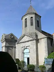 The war memorial and the church of Saint-Sylvain, in Ahun