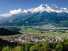 Mountain overlooking an urban area.