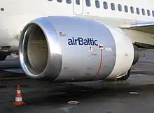  A close-up view of a CFM56-3 series engine mounted on a Boeing 737-500 showing flattening of the nacelle at the bottom of the inlet lip.