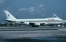 Image of Air Dabia 747, C5-FBS, at Miami Airport in 1999.