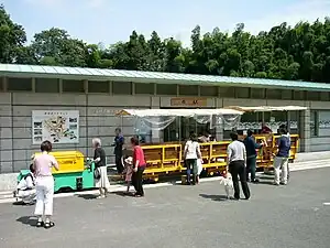 Station entrance with electric tourist train