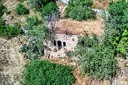 A ruined house, one of the last remains of al-Jura