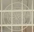 Celtic crest on glazed lobby