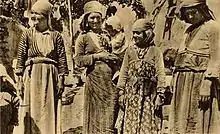 Four women in traditional dress