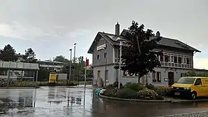 Two-story building with gabled roof