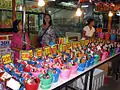 Buckets of alcoholic beverages for sale at the Full Moon Party