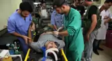 Doctors and medical staff treating injured rebel fighters and civilians in Aleppo