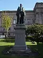 Statue of Alexander Balfour, by Albert Bruce-Joy, plinth designed by Alfred Waterhouse(1889; Grade II)