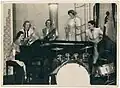 Alice Dolphin Orchestra performing in the dining room at Foy and Gibson c1935. Musicians include: Joyce Smith, Alice Dolphin, Molly Byron, Phyllis Smith and Marj Brown. Photograph by C.J. Frazer.