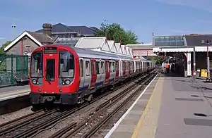 Image 12A Metropolitan line S8 Stock at Amersham in London (from Railroad car)