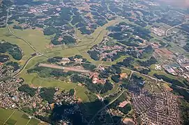 A view of the east part of Ami Town. Ami Airfield on the left.