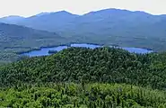 View of Ampersand Lake and the High Peaks to the east