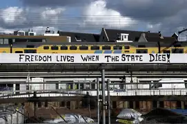 Graffiti on the train line leading to Central Station in Amsterdam