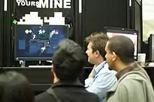 Andy Schatz displaying an early version of Monaco to onlookers at the Game Developers Conference in 2010