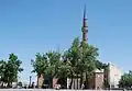 The exterior view of Ankara Hacı Bayram Mosque - The wall of the Monumentum Ancyranum is seen at right.