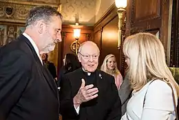 Leo J. O'Donovan, Hendrik Jan Jurriaan Schuwer, and Katrina Swett